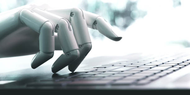 Robot hand using computer keyboard.