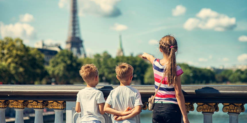 Kid tourists visiting Paris