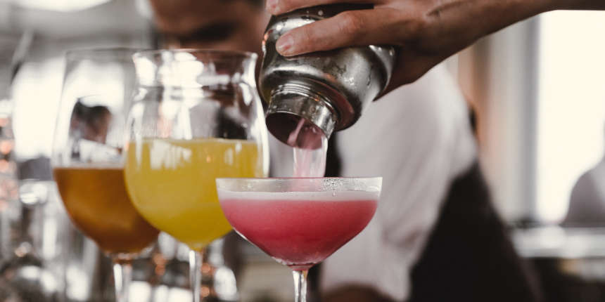 Colorful cocktails being poured