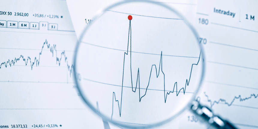 Magnifying glass showing a sudden spike in a line chart