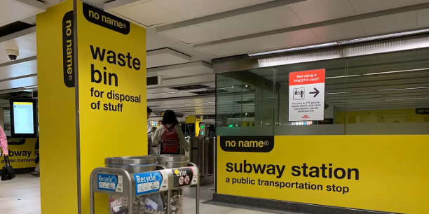 No Name adverts of a waste bin and subway station at a Toronto subway station