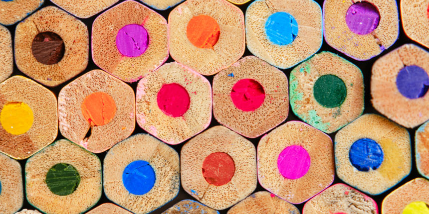 A close-up macro image of a group of colored pencils.