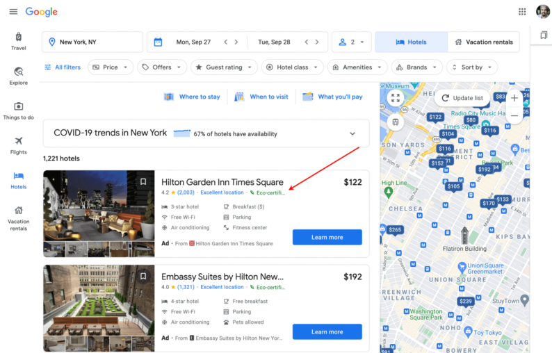 Screenshot of Google hotel listings with a red arrow pointing to the eco-friendly attribute tag