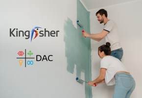 A man and woman painting a wall green with roller brushes, next to logos for Kingfisher and DAC.
