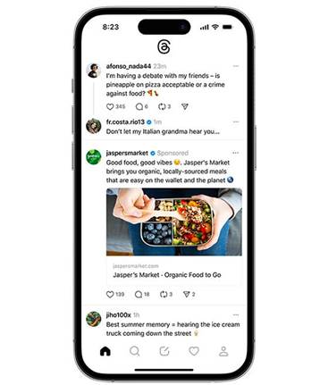 alt="A smartphone screen showing a social media feed with posts. One post debates pineapple on pizza, another is a sponsored ad from a market promoting organic food, and the last post reminisces about ice cream trucks."
