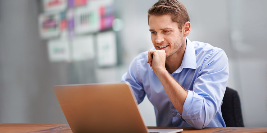 Businessman using his laptop