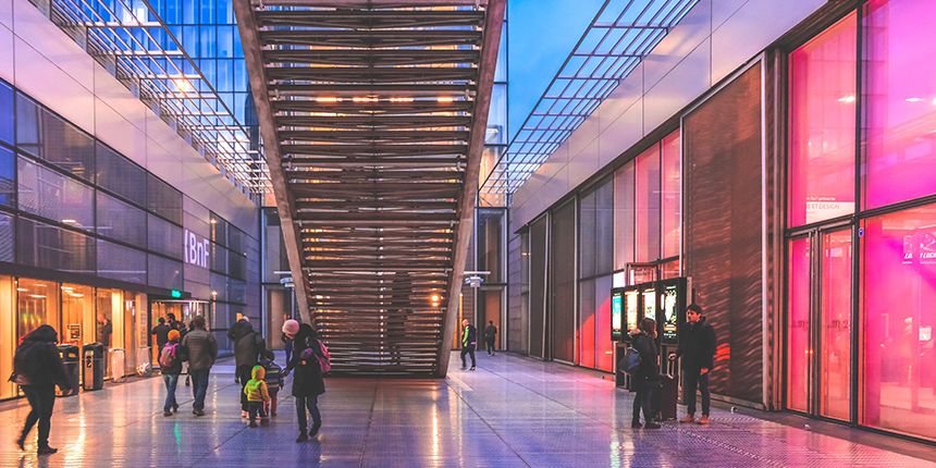 Inside of a shopping mall at night.